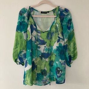 Flowy floral tie neck blouse